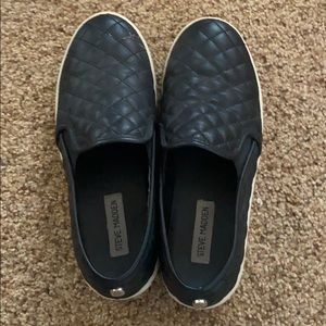 Steve Madden black leather quilted slip ons